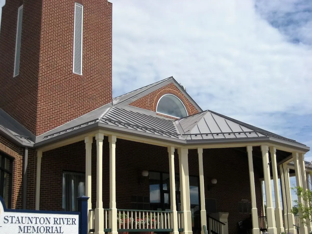 Skilled roofing craftsmen working on a residential roof in Eglin Afb